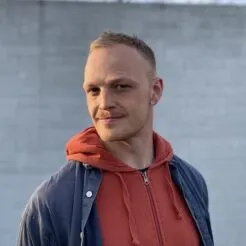 George infront of a wall