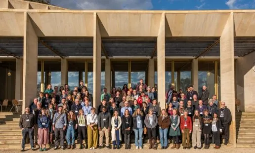 Delegates to the conference stand on the steps outside Worcester Colleage