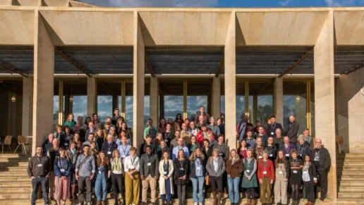 Delegates to the conference stand on the steps outside Worcester Colleage